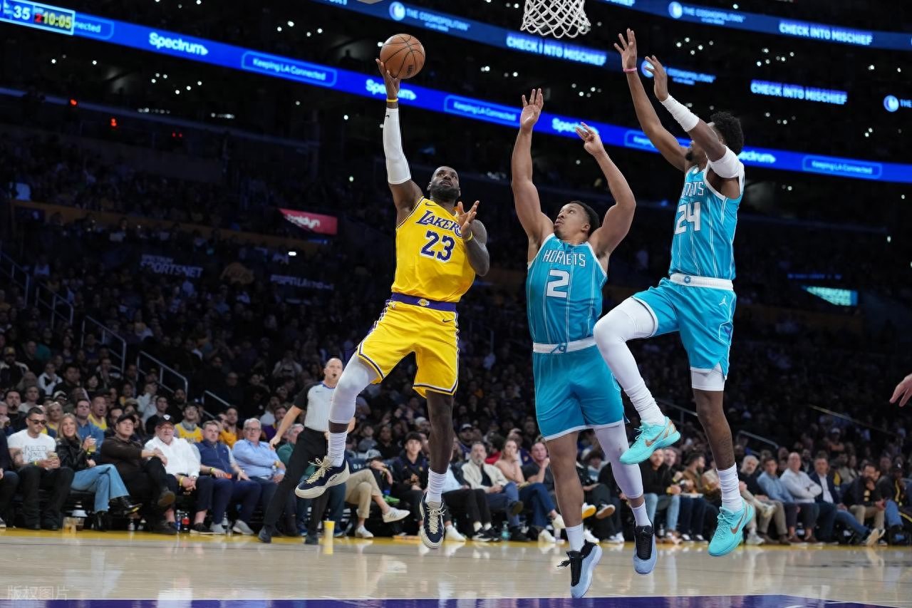 Doncic and James combine for 68 points but fall short, LaMelo Ball scores 30 with nine three-pointers as Hornets dominate Lakers