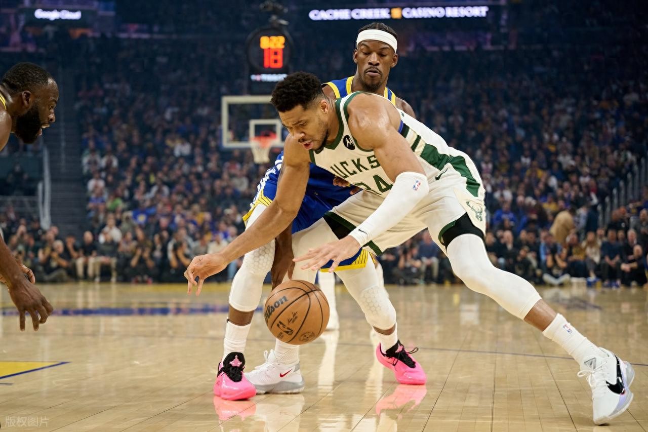 Antetokounmpo scored 34 and grabbed 10 rebounds in a losing effort; Curry had 31 points, 7 rebounds, and 7 assists as three Warriors players scored over 20 to defeat the Bucks.